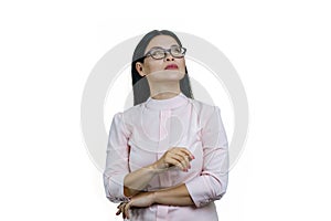 Portrait of smart thoughtful asian businesswoman is looking up.