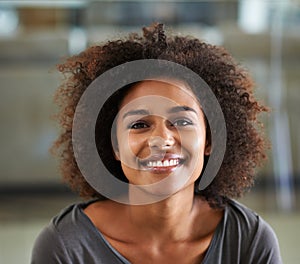 Portrait, smile and afro with black woman in home to relax on weekend for morning free time. Face, girl and natural with