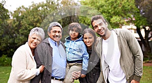 Portrait, smile and big family together in nature at garden for bonding, relationship or love at backyard. Face, park or