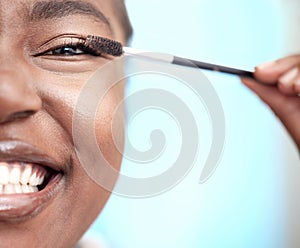 Portrait, smile and black woman with mascara brush in home bathroom for skincare, makeup or extension. Apply cosmetics