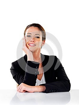 Portrait, smile and business woman at desk in studio isolated on a white background. Face, happy professional and