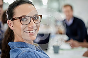Portrait, smile and business woman with glasses in office for career, job and coworking at startup workplace. Face