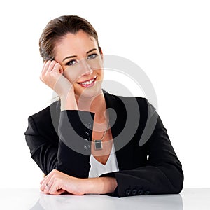 Portrait, smile and business woman at table in studio isolated on a white background. Face, happy professional and