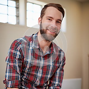 Portrait, smile and man in workplace, architecture and career in construction industry on break. Male person, contractor