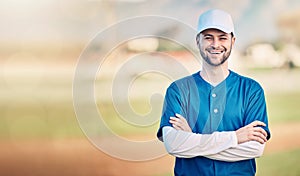 Portrait, smile and mockup with a baseball man standing arms crossed outdoor on a sports pitch. Fitness, training and
