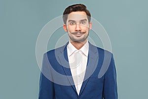 Portrait of smiley businessman with mustache