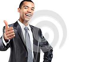 Portrait of a smiling African American business man gesturing a thumbs up sign