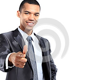 Portrait of a smiling African American business man gesturing a thumbs up sign