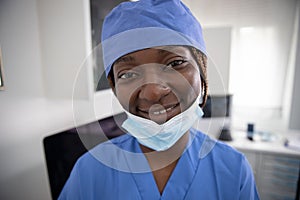 Portrait of a smiling african female doctor in the clinic