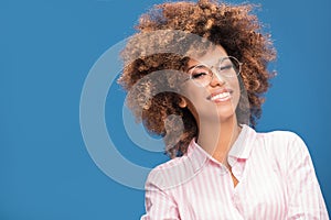 Portrait of afro girl in eyeglasses.