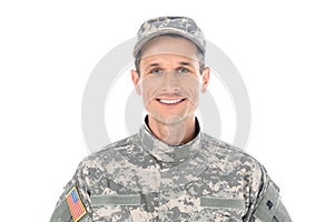 portrait of smiling american soldier in military uniform looking at camera