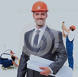 Portrait of a smiling architect. against the backdrop team