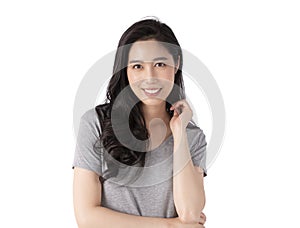 Portrait of a smiling Asian business woman looking at camera isolated over white background. Happy Young Asian Woman with blank co