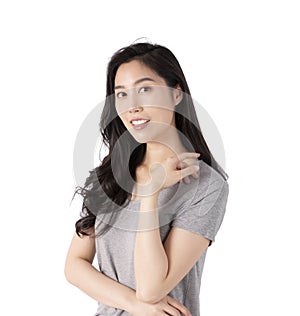 Portrait of a smiling Asian business woman looking at camera isolated over white background. Happy Young Asian Woman with blank co