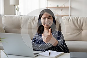 Portrait of smiling Asian girl recommend distant study course