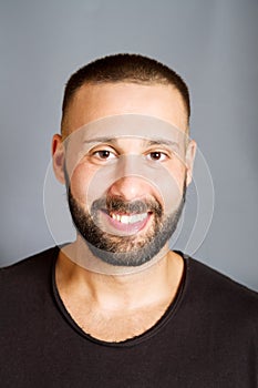 Portrait of smiling beared man