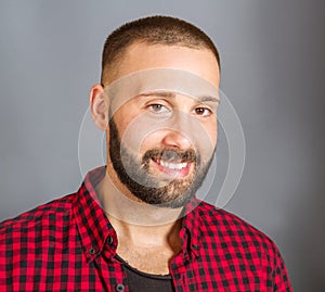 Portrait of smiling beared man