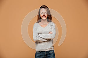 Portrait of smiling beautiful brunette woman looking at camera,