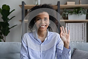 Portrait of smiling biracial woman have webcam call