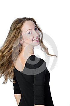 Portrait of a smiling blond girl on a white background.