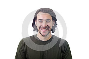 Portrait of smiling brunette young man, long curly hair style, looking joyful and laughing to camera isolated on white background