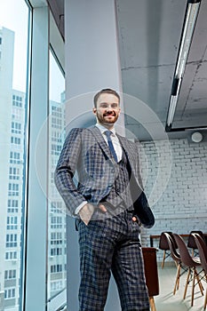 Portrait of smiling business man in office