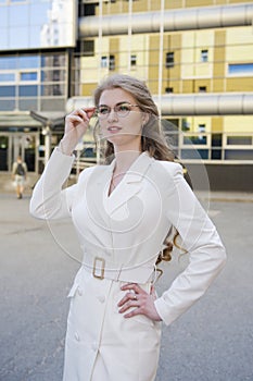 Portrait of a smiling business woman in glasses