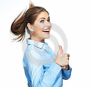 Portrait of smiling business woman show Thumb Up. Long motion hair.