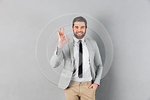 Portrait of a smiling businessman dressed in suit