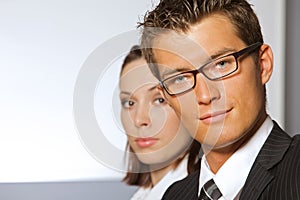 Portrait of smiling businessman and woman