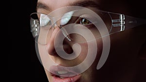 Portrait of smiling businesswoman winking in virtual glasses in office.