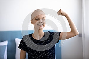 Portrait of smiling cancer patient show strength beat disease