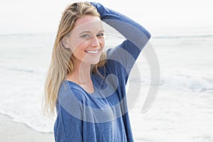 Portrait of a smiling casual woman at beach