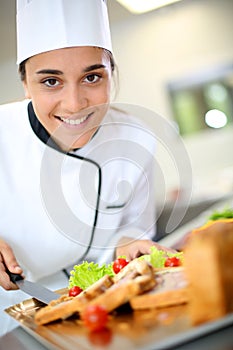 Portrait of smiling caterer girl