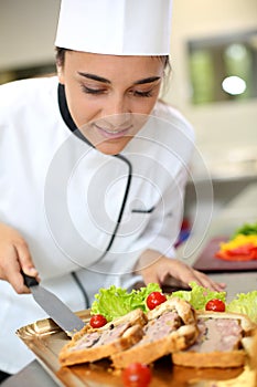 Portrait of smiling caterer girl photo