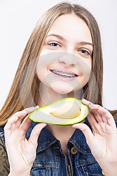 Portrait of Smiling Caucasian Female Teenager With Teeth Braces.