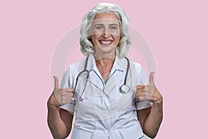 Portrait of smiling cheerful female doctor with stethoscope.