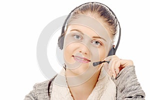 Portrait of smiling cheerful support phone operator in headset.