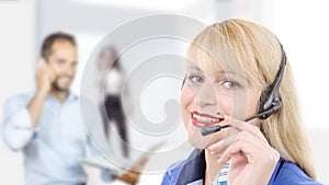 Portrait of smiling cheerful support phone operator in headset.