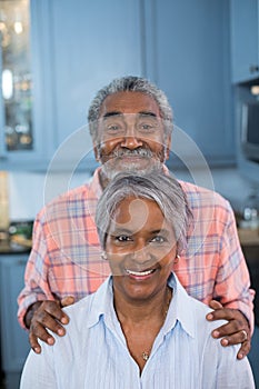 Portrait of smiling couple at home