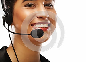 Portrait of smiling customer support female phone worker, over w