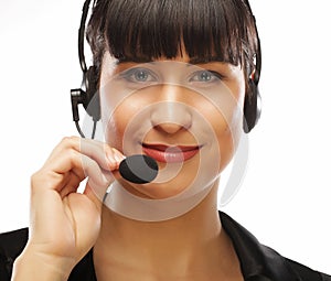 Portrait of smiling customer support female phone worker, over w