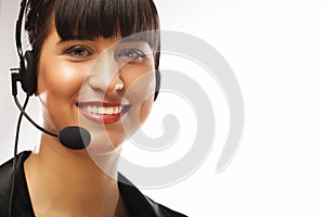 Portrait of smiling customer support female phone worker