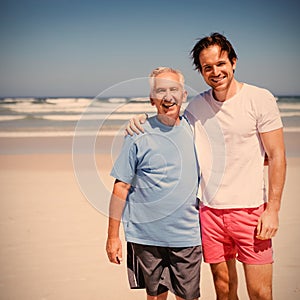 Portrait of smiling family at beach