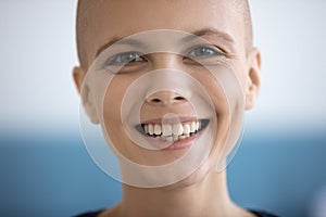 Portrait of smiling female cancer patient feel overjoyed