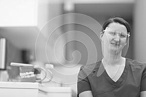 Portrait of a smiling female dentist