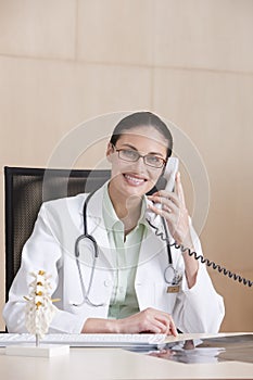 Portrait of smiling female doctor