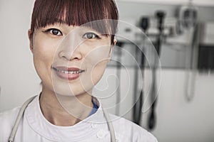 Portrait of smiling female doctor