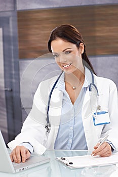 Portrait of smiling female doctor