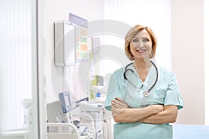 Portrait of smiling female doctor in hospital